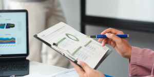 Employee filling out KRA and KPI sections in an appraisal form with performance metrics and goals