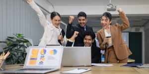 Employee promotion criteria concept with manager evaluating performance and leadership potential in office setting