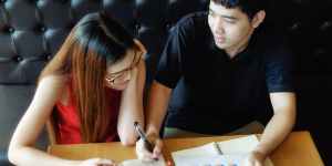 Employee filling out KRA and KPI sections in an appraisal form with performance metrics and goals