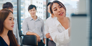 Asia businessmen and businesswomen meeting brainstorming ideas about the Effective Ways to Upskill Workforce