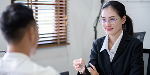 Business team discussing hiring strategies to overcome recruitment challenges in Cambodia